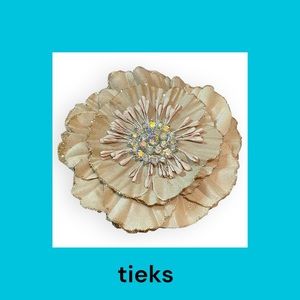 One Champagne Tieks Flower